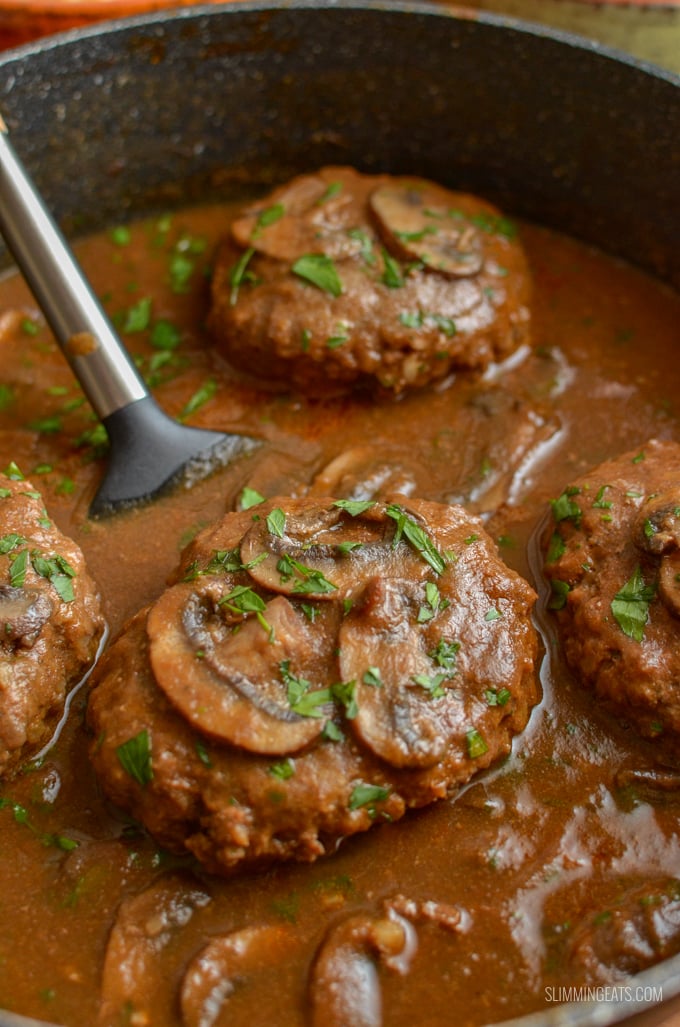 Enjoy a plate of this delicious Syn Free Salisbury Steak with Gravy - tender beef patties with hidden cauliflower smothered in a delicious rich mushroom onion gravy. Gluten Free, Dairy Free, Paleo, Whole30, Slimming World and Weight Watchers friendly | www.slimmingeats.com #slimmingworld #weightwatchers #paleo #beef #synfree #3points