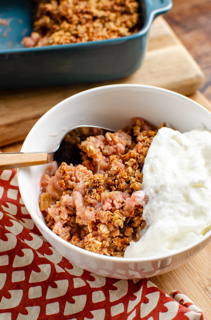 Nothing better than a delicious bowl of Cinnamon Oat Rhubarb Crumble - sweet tangy stewed rhubarb topped with a yummy golden topping. gluten free, dairy free, vegetarian, Slimming Eats and Weight Watchers friendly #slimmingworld #weightwatchers