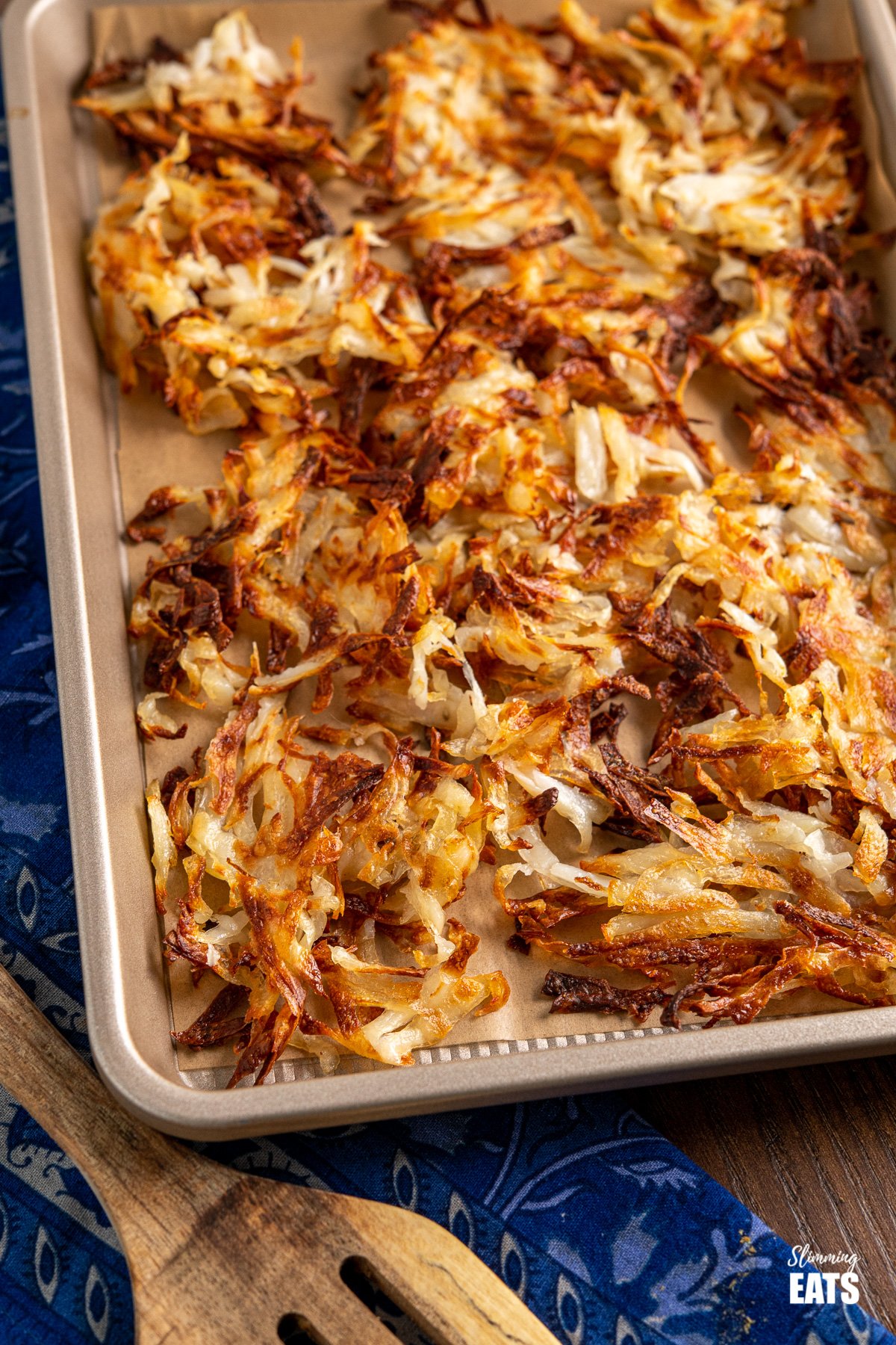 American shredded potato hash browns on baking tray