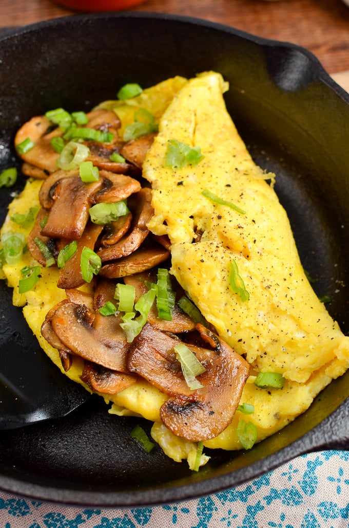 A sticky sriracha mushroom omelette recipe that is perfect for breakfast, lunch or dinner. Delicious fluffy omelette with spicy sweet sticky sriracha mushrooms. Perfect!! - gluten free, dairy free, vegetarian, Slimming Eats and Weight Watchers friendly #weightwatchers #breakfast #eggs #mushrooms #sriracha A sticky sriracha mushroom omelette recipe that is perfect for breakfast, lunch or dinner. Delicious fluffy omelette with spicy sweet sticky sriracha mushrooms. Perfect!! - gluten free, dairy free, vegetarian, Slimming Eats and Weight Watchers friendly #weightwatchers #breakfast #eggs #mushrooms #sriracha