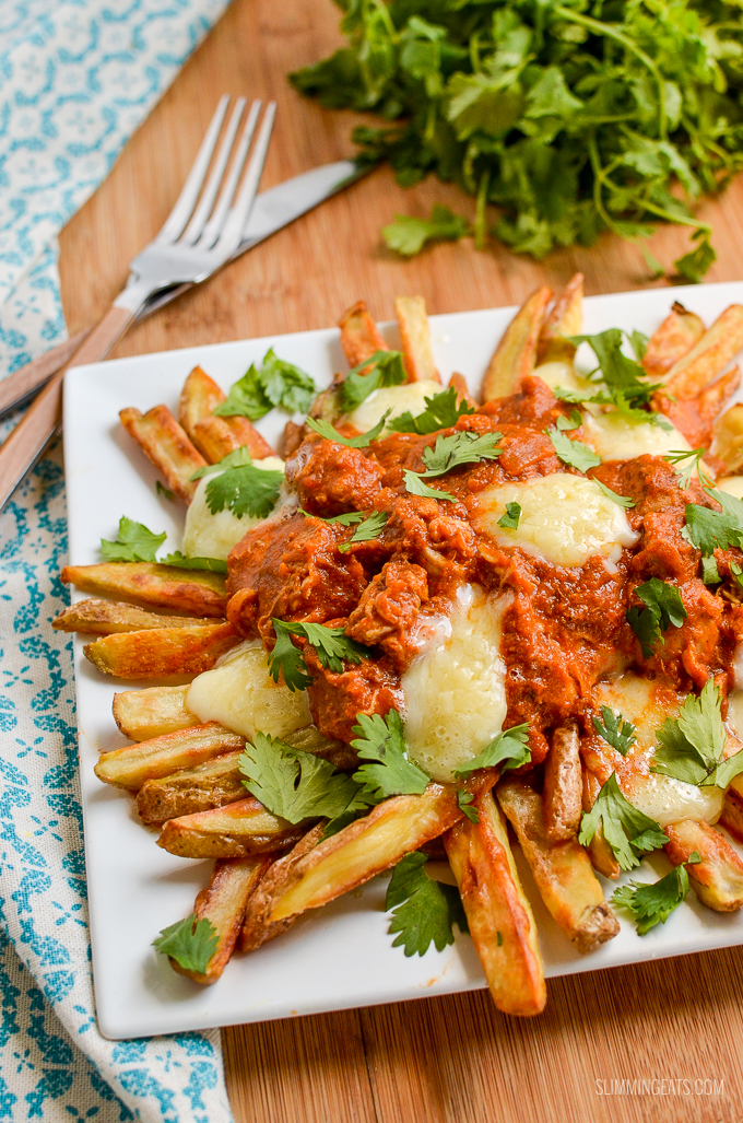 Butter Chicken Poutine!! - The ultimate dish for leftover butter chicken - crispy golden syn free fries, topped with butter chicken and melted cheese make this one of those recipes you will not ever want to end. Gluten Free, Slimming World and Weight Watchers friendly