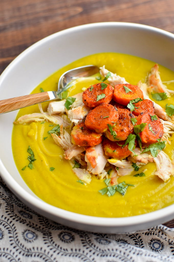 The beautiful vibrant colour of turmeric makes this delicious and healthy Golden Cauliflower Soup with Roasted Paprika Carrots | gluten free, dairy free, paleo, Whole30, Slimming Eats and Weight Watchers friendly