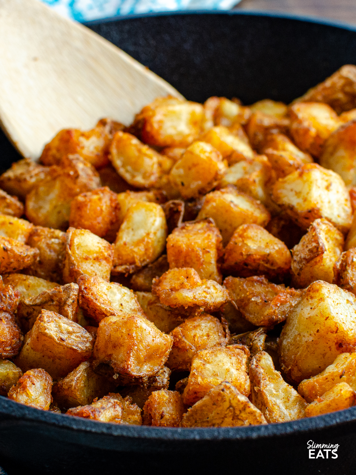 cooked home fries in a cast iron skillet