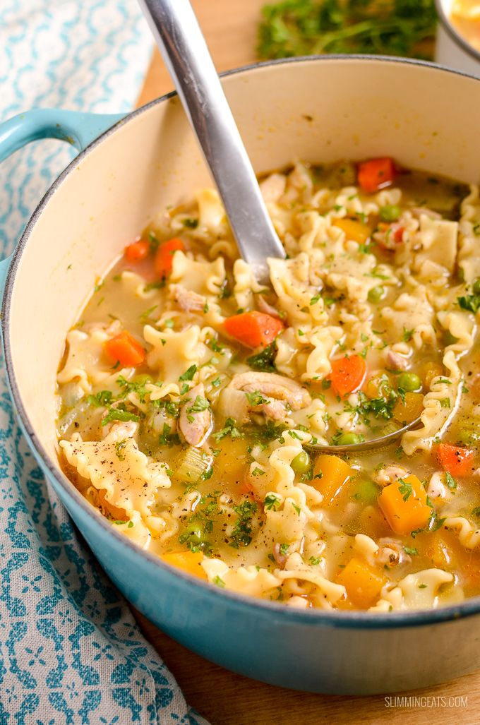 Chicken Vegetable Pasta Soup in a dutch oven pot with ladle