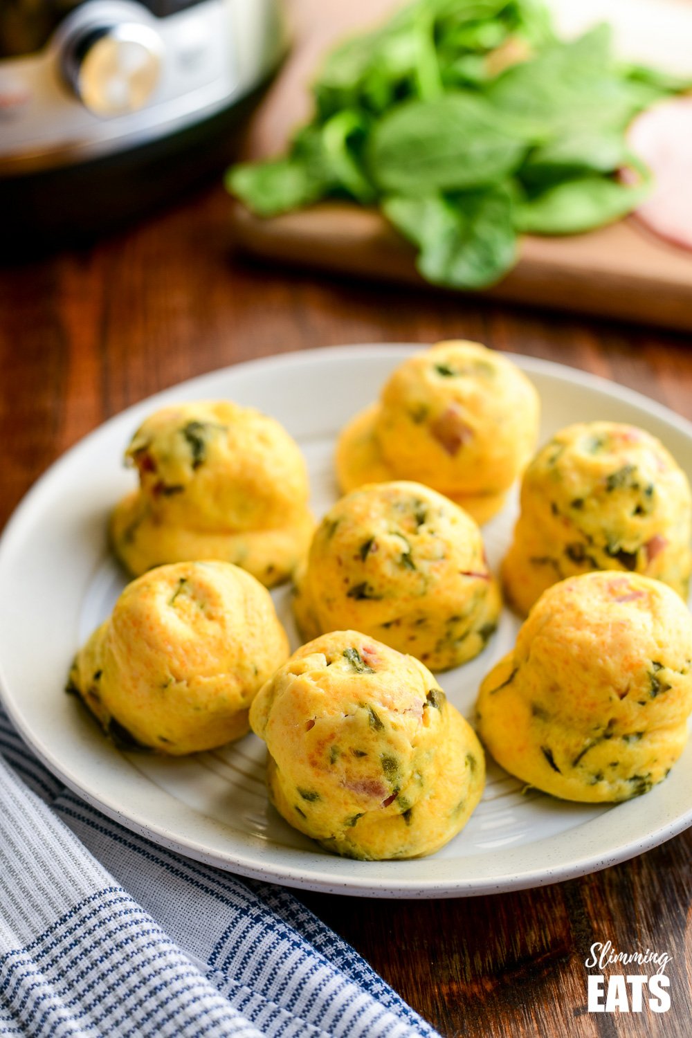 Instant Pot Sous Vide Egg Bites on cream and white plate on wooden board