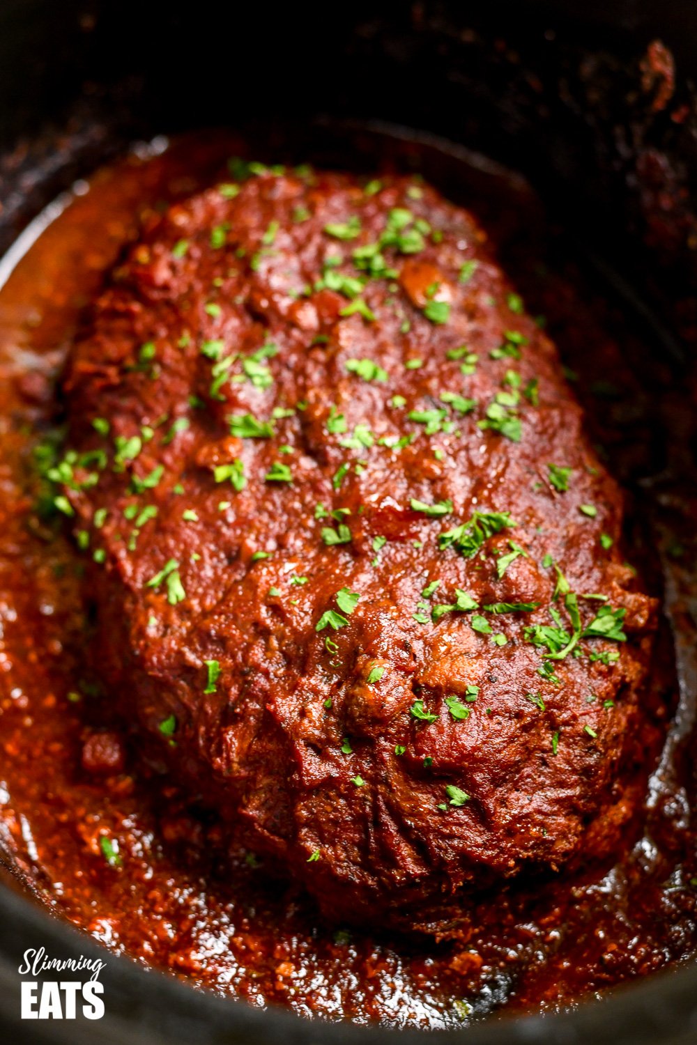 Slow Cooker Chicken Mushroom Meatloaf - a super easy recipe for a tender delicious meatloaf with the yummy rich flavour of mushrooms all topped with a delicious tomato glaze. slow cooker chicken mushroom meatloaf in slow cooker