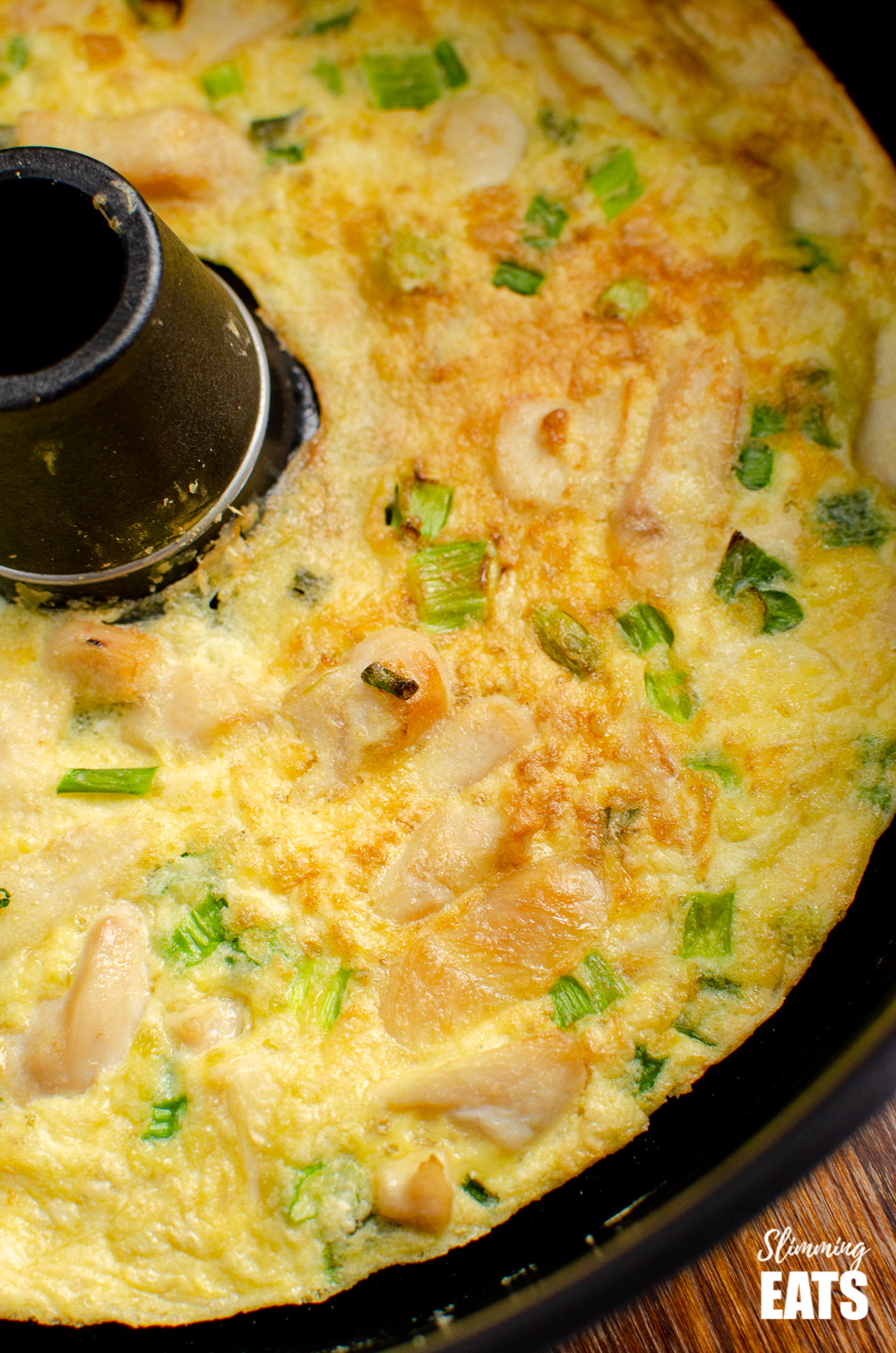 Thai chicken omelette in pan of Tefal Actifry