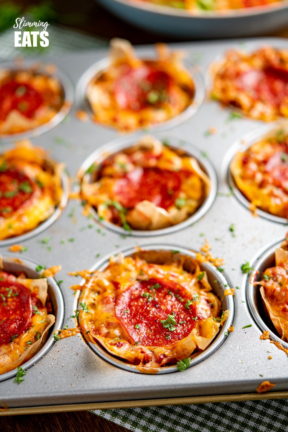 Pepperoni Pizza Egg Bites in a muffin tray