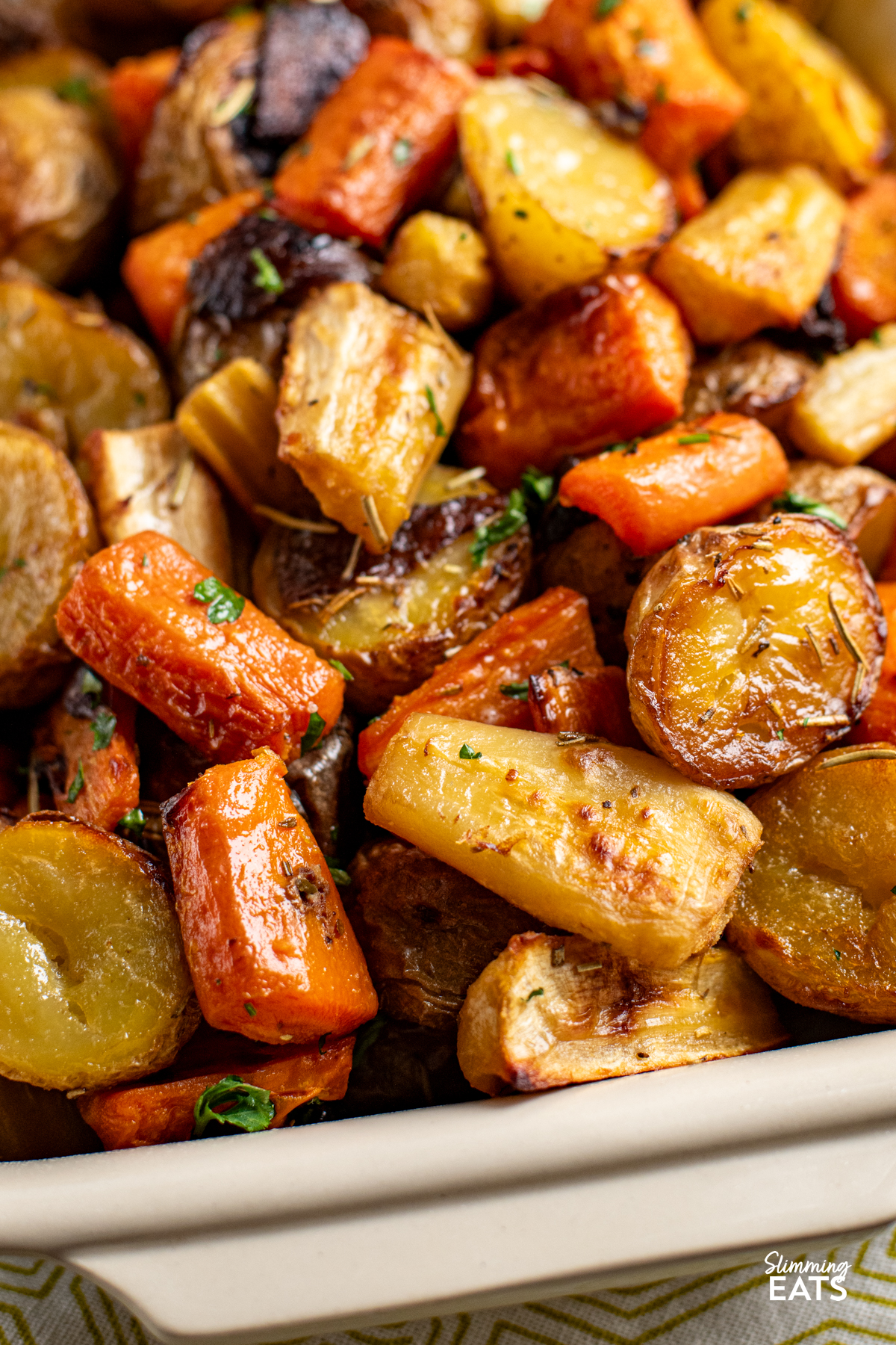 Rosemary Roasted Potatoes, Parsnips, Carrots and Onion in a dish
