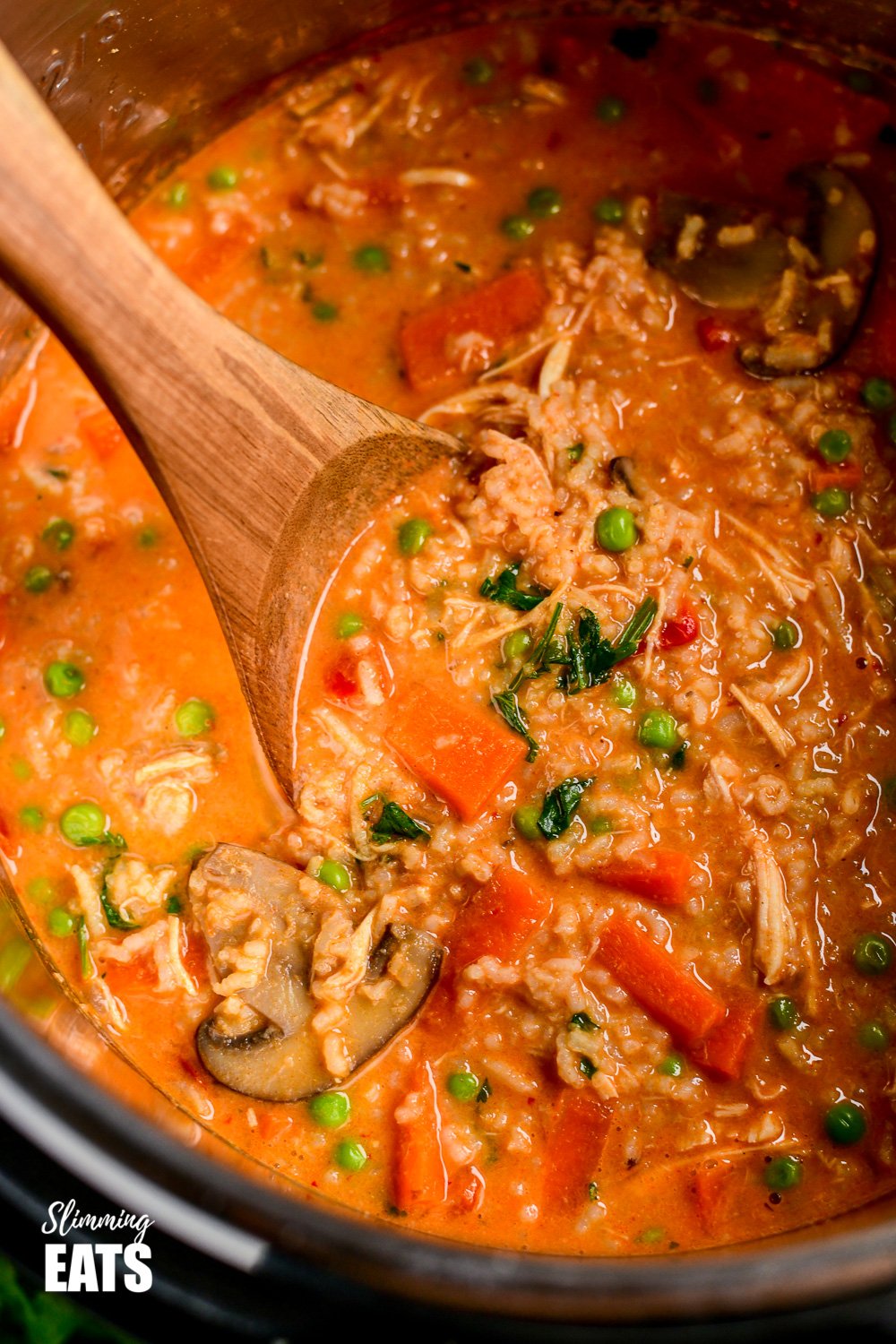 Delicious Instant Pot Thai Chicken Rice Soup - a fragrant soup that is super quick and easy to make. Gluten Free, Dairy Free, Slimming Eats and Weight Watchers friendly close up of Thai Chicken Rice Soup in instant pot
