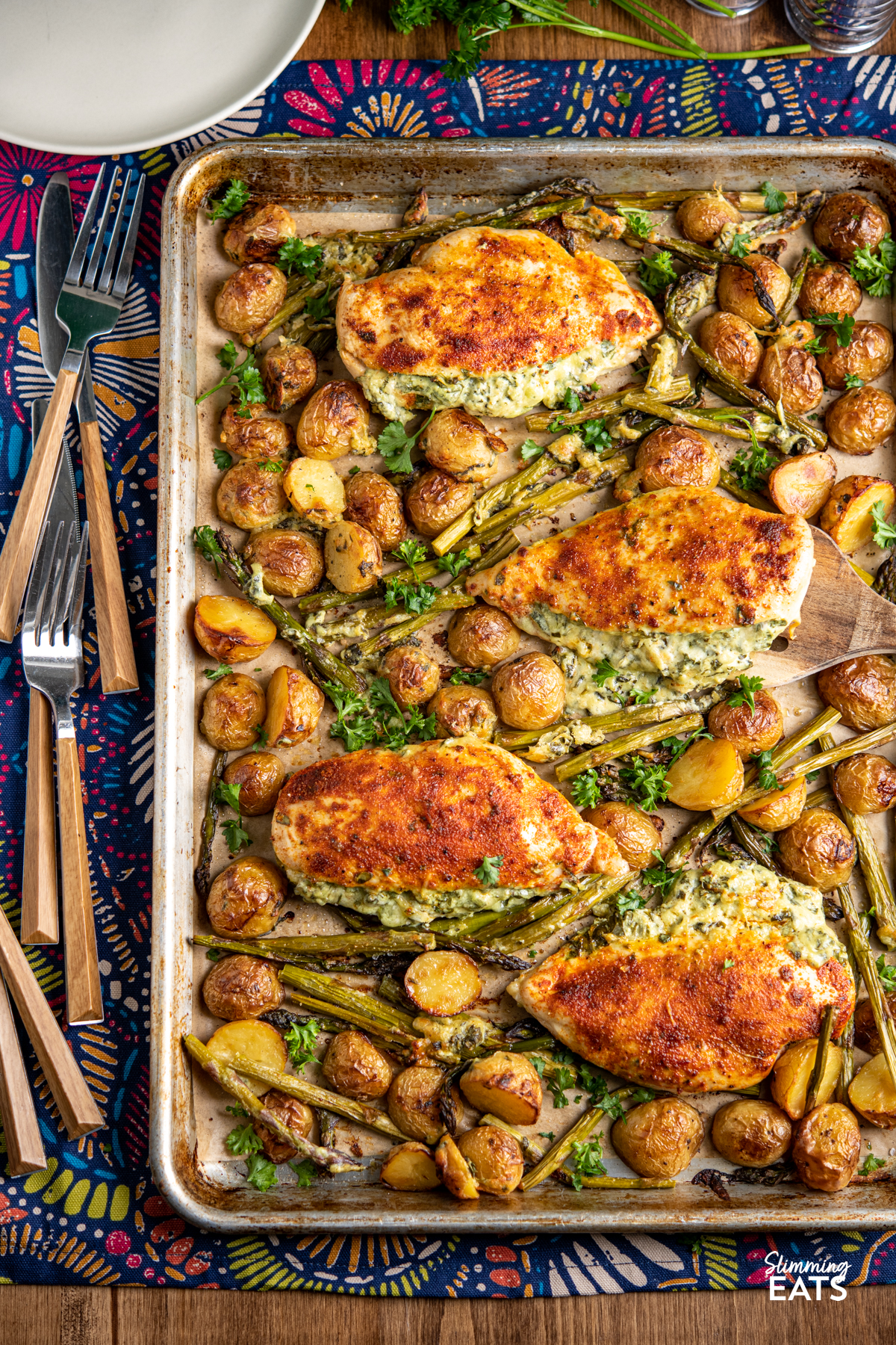 Creamy Cheesy Spinach Stuffed Chicken Tray Bake - Tender Juicy Chicken Breasts with a Creamy Parmesan Spinach Stuffing all baked on one tray with Baby Yukon Gold Potatoes and Asparagus. Gluten Free, Slimming Eats and Weight Watchers friendly