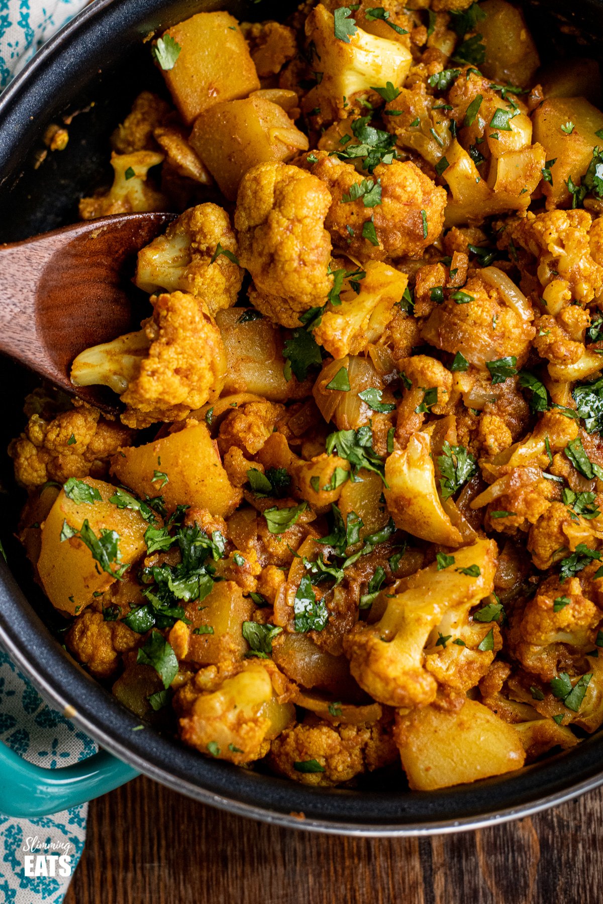 close up of aloo gobi in frying pan