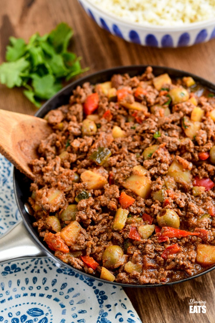 Cuban Beef Picadillo - a delicious hearty ground beef Cuban inspired recipe with flavoursome spices, potatoes, vegetables, olives and sultanas. #Cuban #picadillo #olives #beef #slimmingeats #weightwatchers #glutenfree #dairyfree