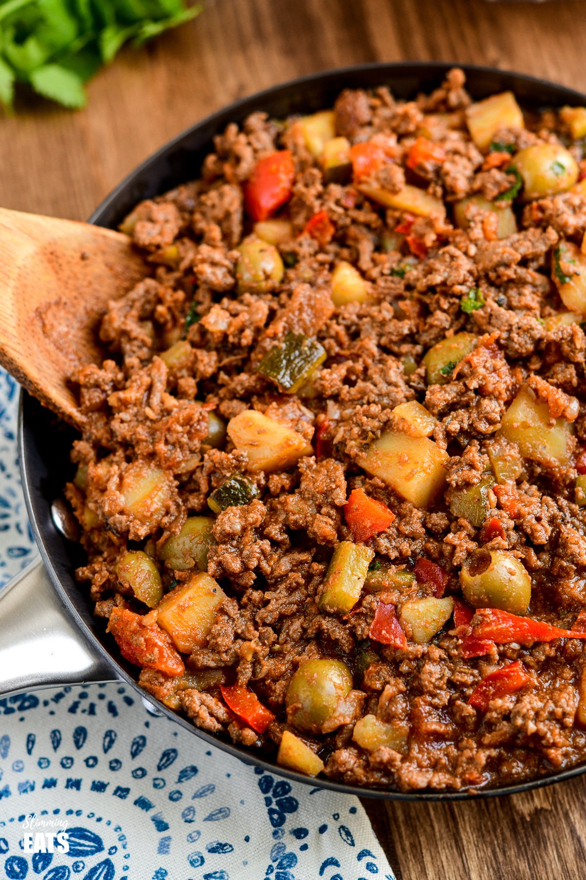 cuban beef picadillo close up in frying pan