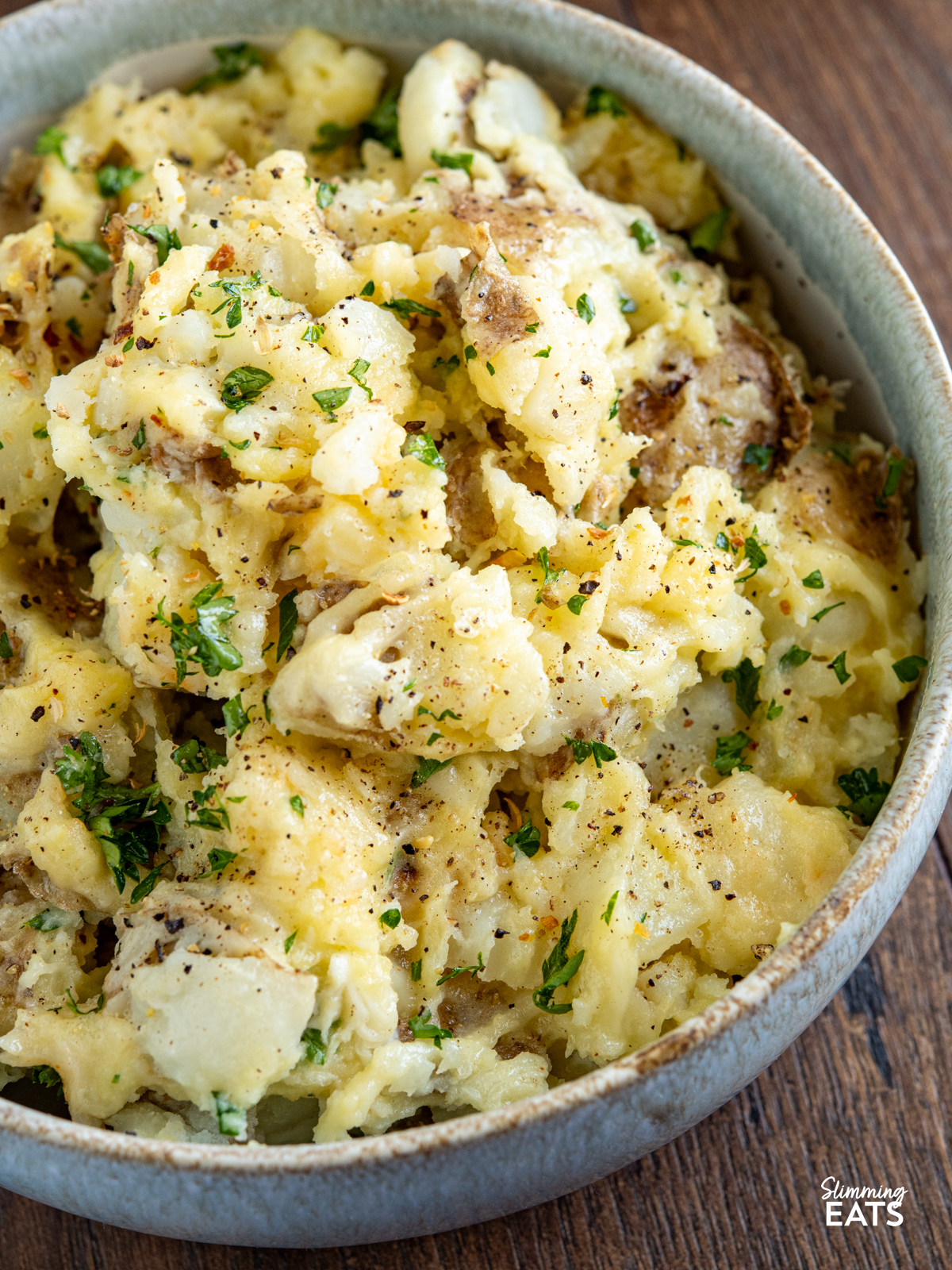 Rustic Garlic and Parmesan Mashed Potatoes (from www.slimmingeats.com) - this easy rustic mash combines skin on Yukon Golden Potatoes with the delicious flavours of garlic and parmesan for the perfect side for any main meal.
