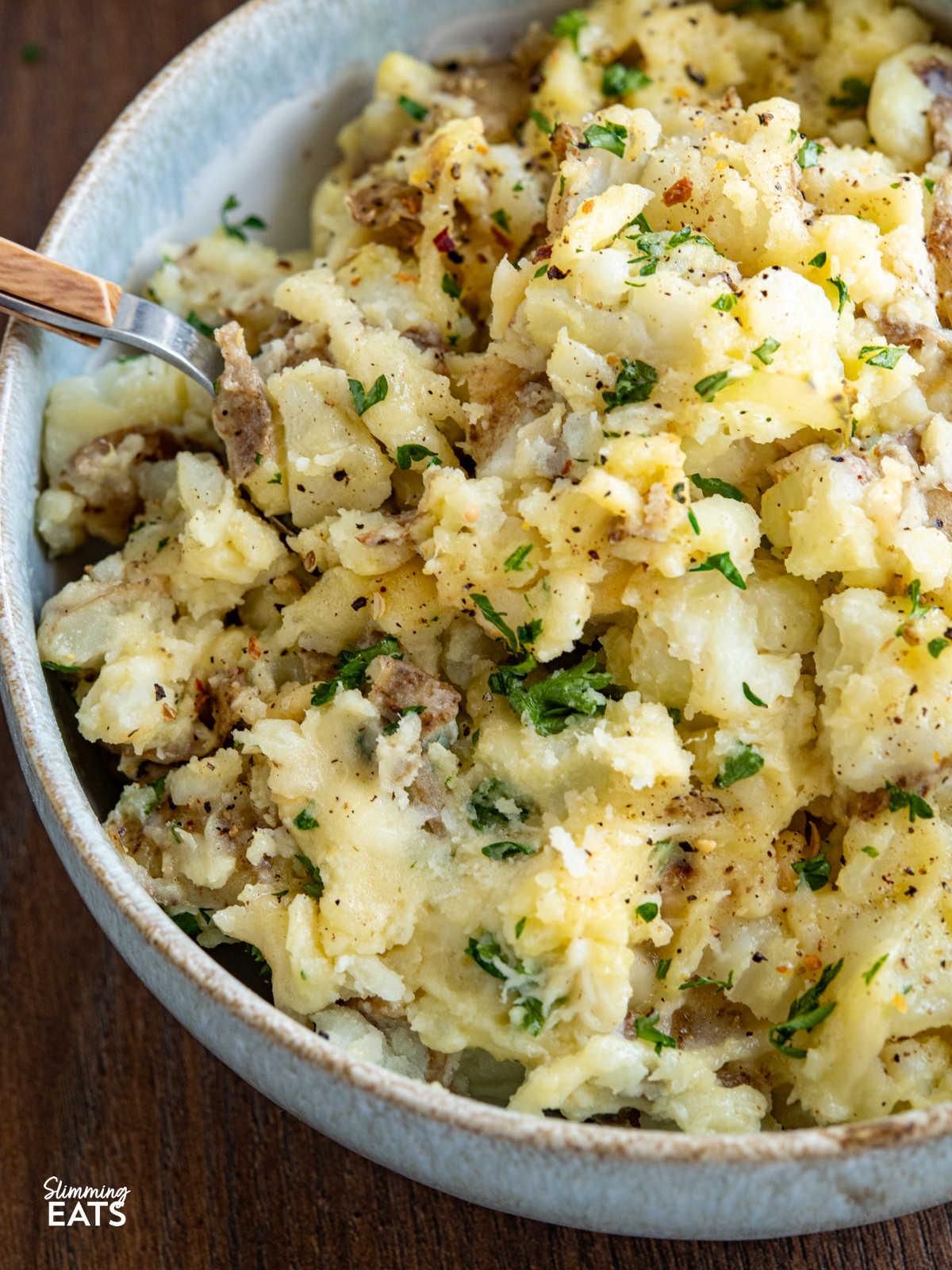 Rustic Garlic and Parmesan Mashed Potatoes (from www.slimmingeats.com) - this easy rustic mash combines skin on Yukon Golden Potatoes with the delicious flavours of garlic and parmesan for the perfect side for any main meal.