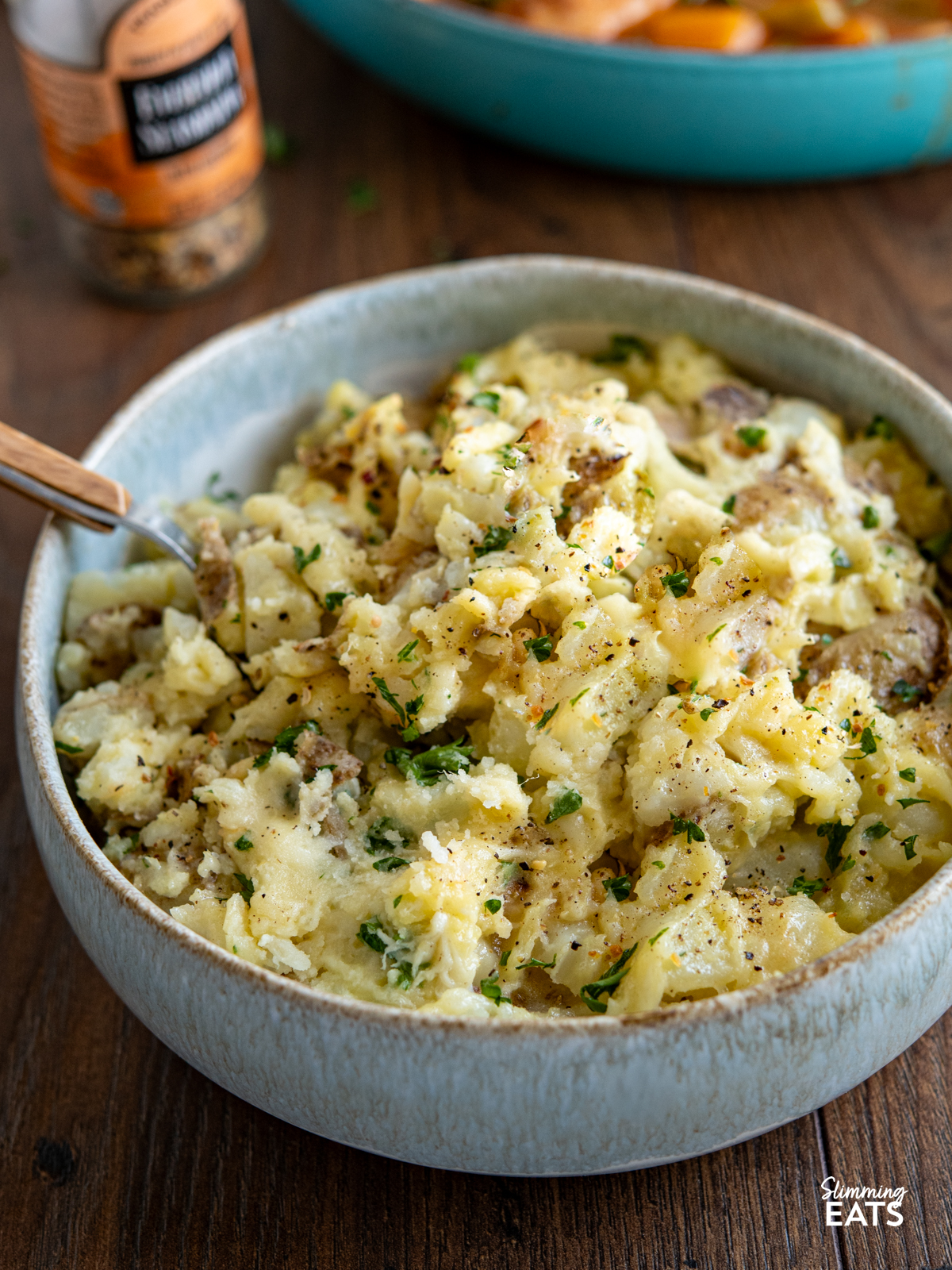 Rustic Garlic and Parmesan Mashed Potatoes (from www.slimmingeats.com) - this easy rustic mash combines skin on Yukon Golden Potatoes with the delicious flavours of garlic and parmesan for the perfect side for any main meal. #potatoes #mash #cheese #slimmingeats #weightwatchers