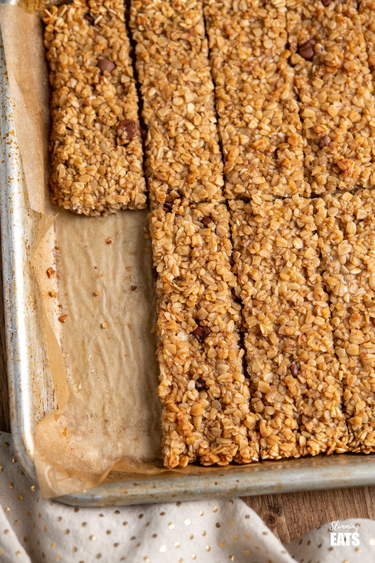 Healthy Chocolate Chip Banana Granola Bars on a baking tray 