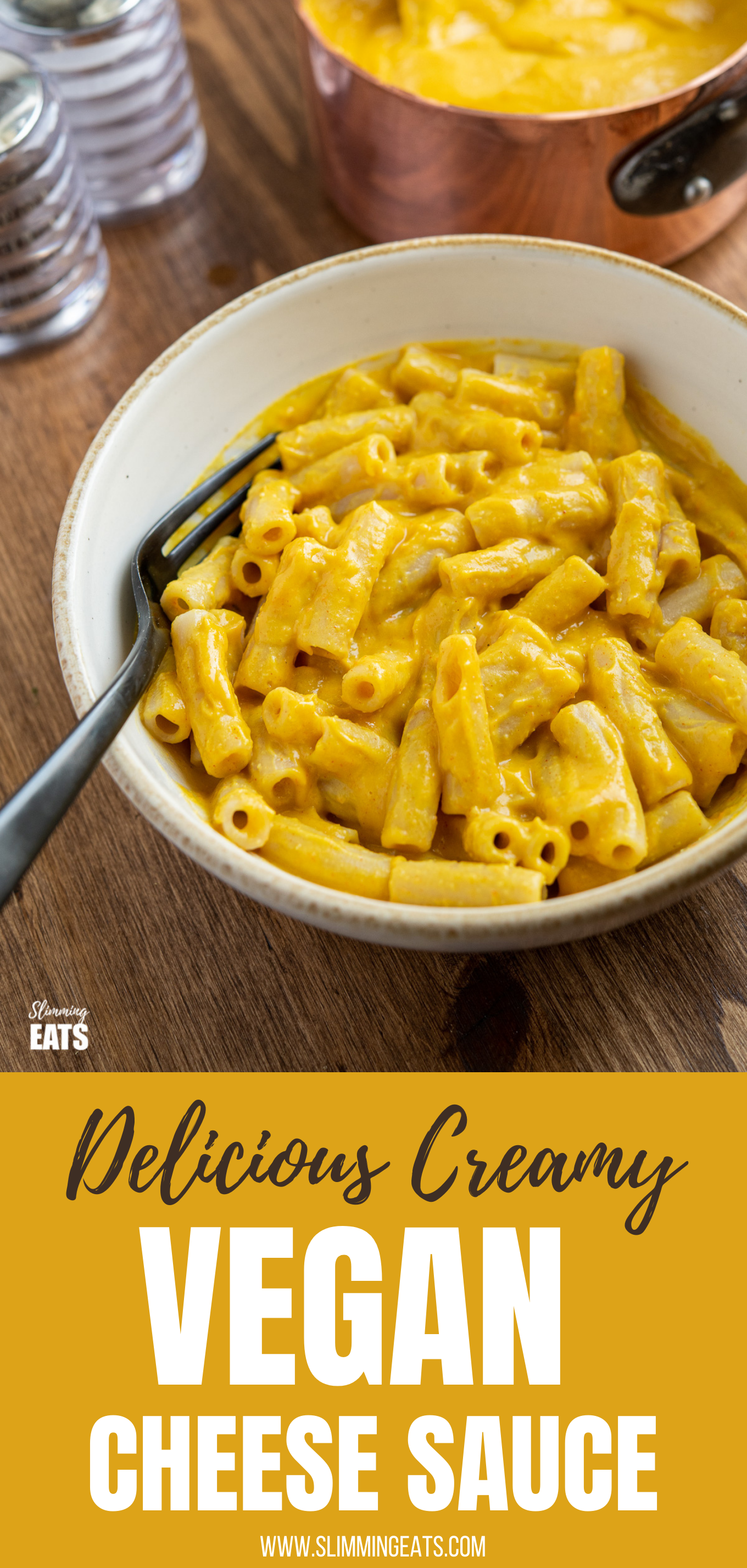Delicious Creamy Vegan Cheese Sauce in bowl over pasta with black fork