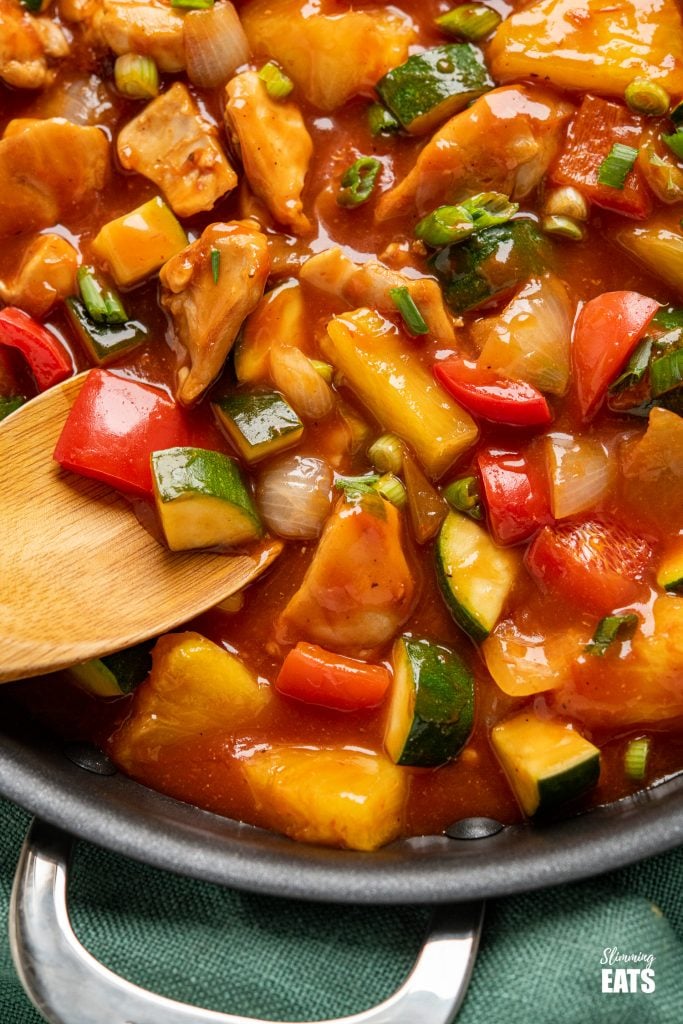 close up of chinese sweet and sour chicken in pan