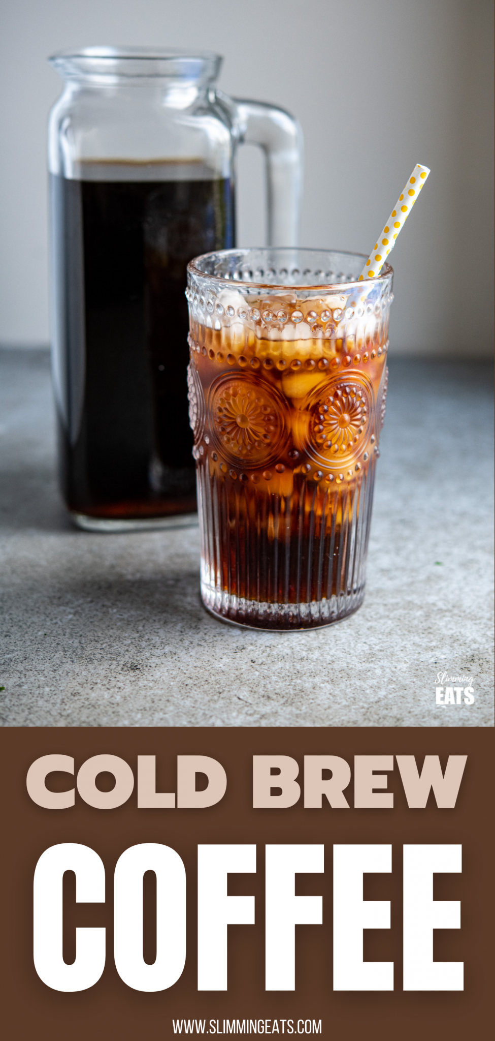cold brew coffee with ice in a glass with yellow spotted white straw, jug of cold brew in background