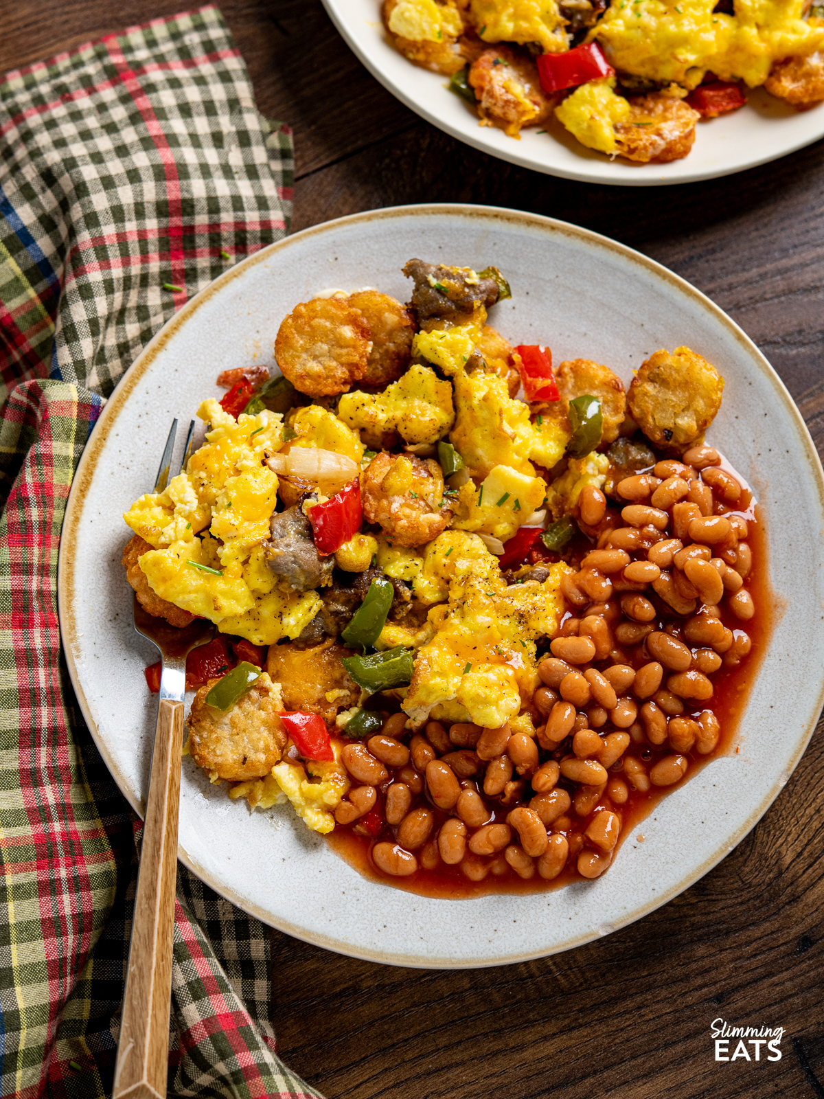 Air Fryer Breakfast Loaded Tater Tots (Totchos) on a plate with baked beans