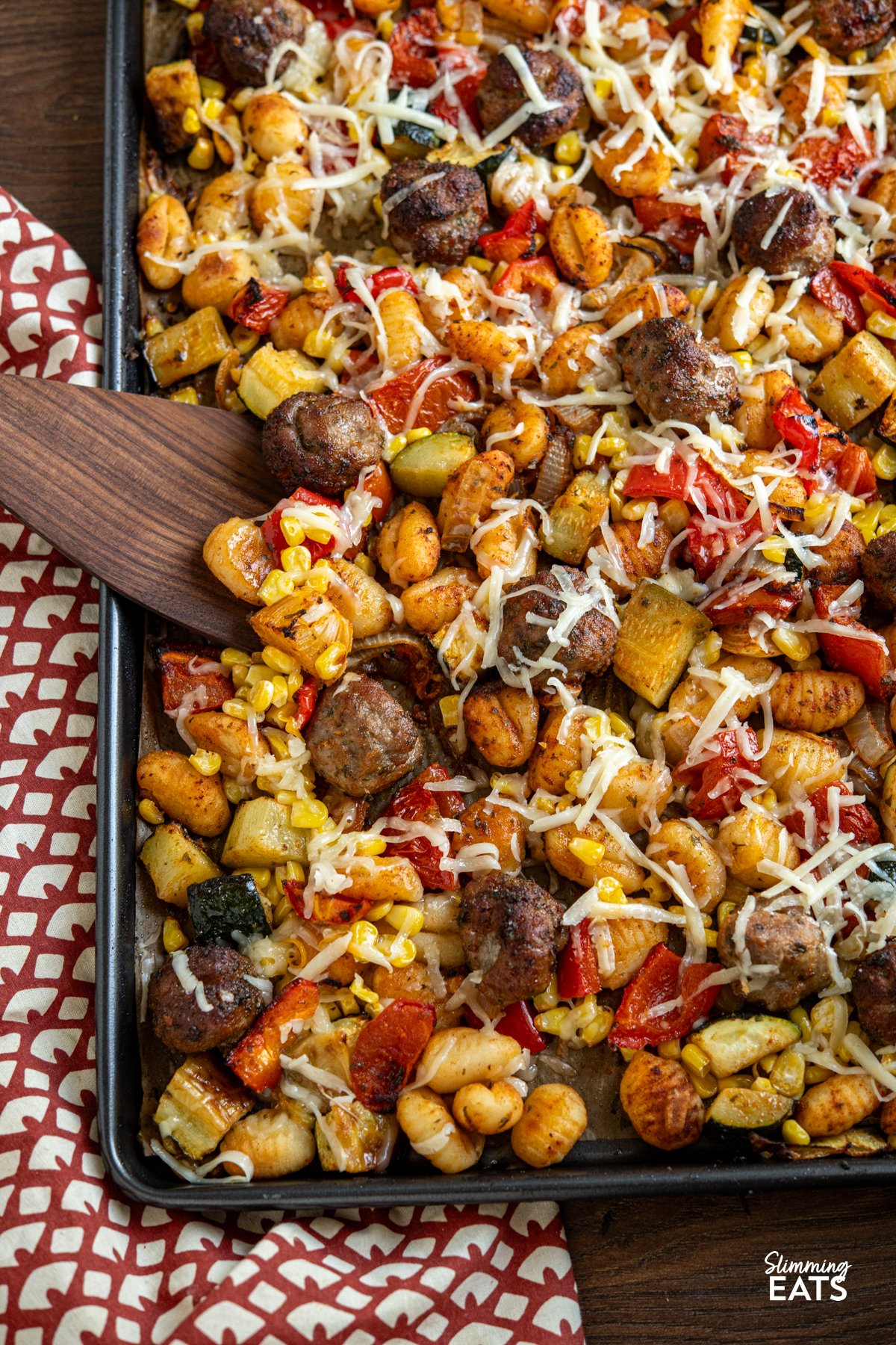 Sausage Meatballs with Gnocchi on baking tray lined with parchment