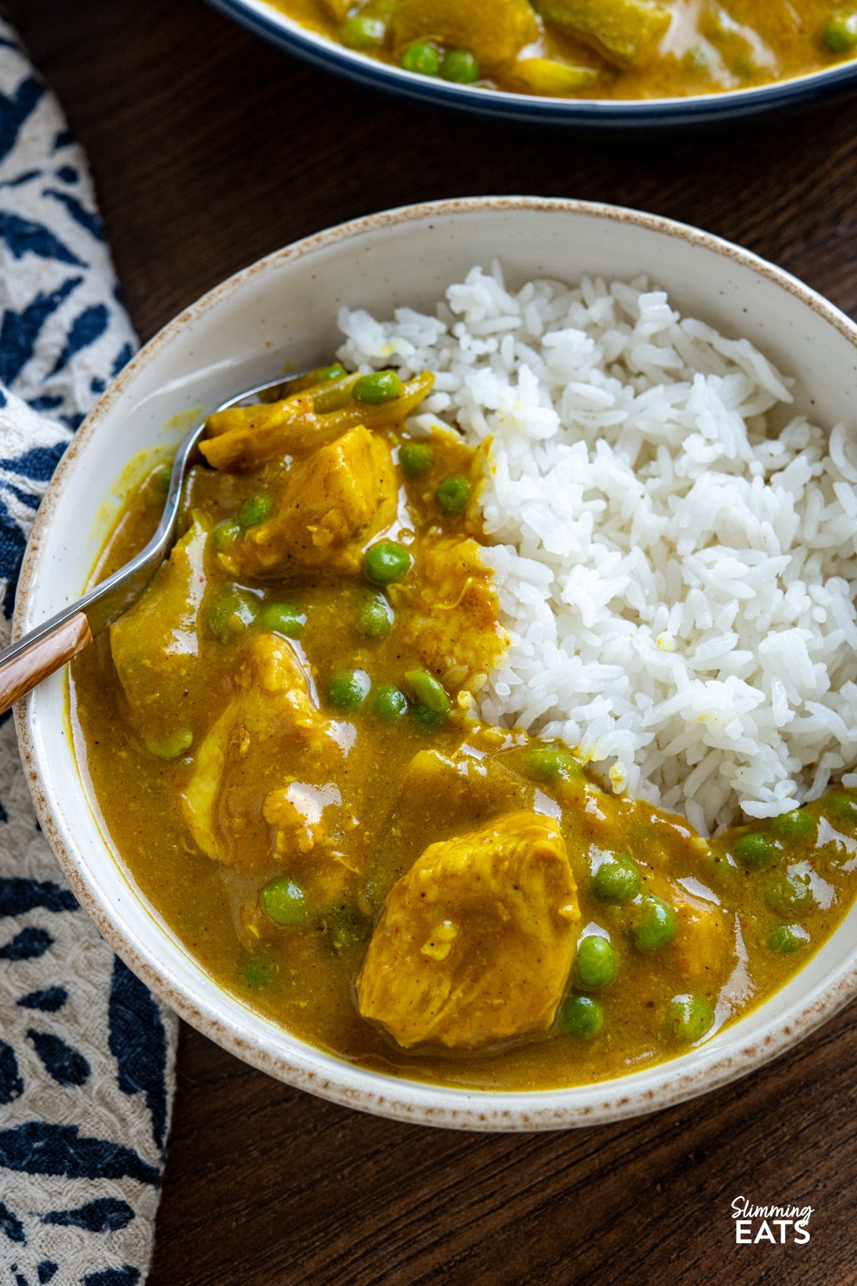 Slow Cooker Chinese Chicken Curry in a bowl with jasmine rice