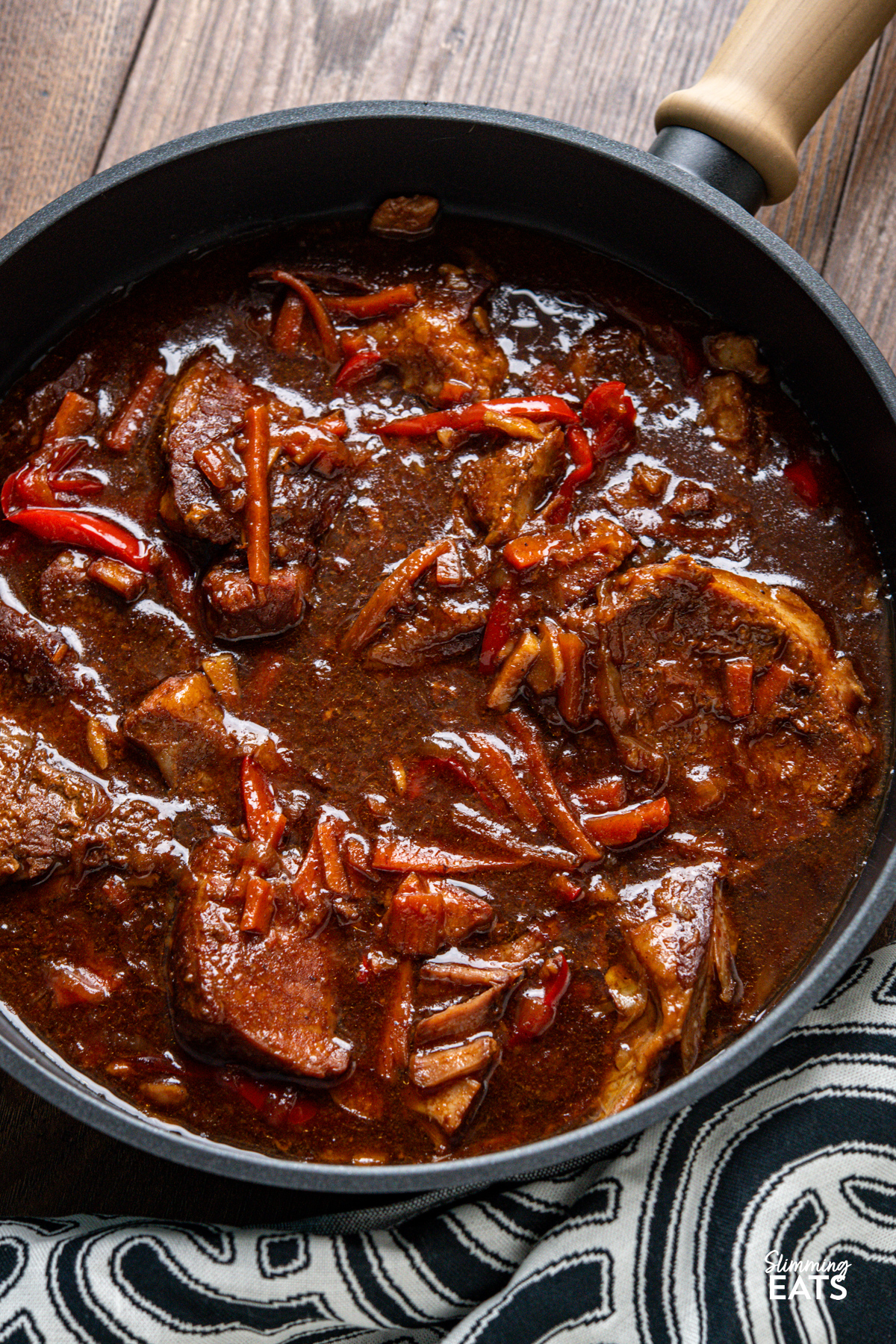 close up of Slow Cooker Honey Tamarind Pork in a skillet